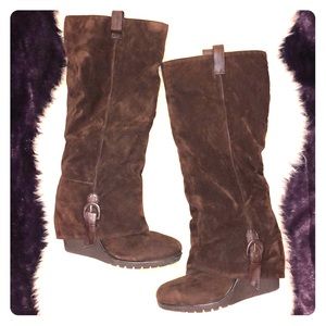 Brown knee-high wedge boots. Size: 8.5